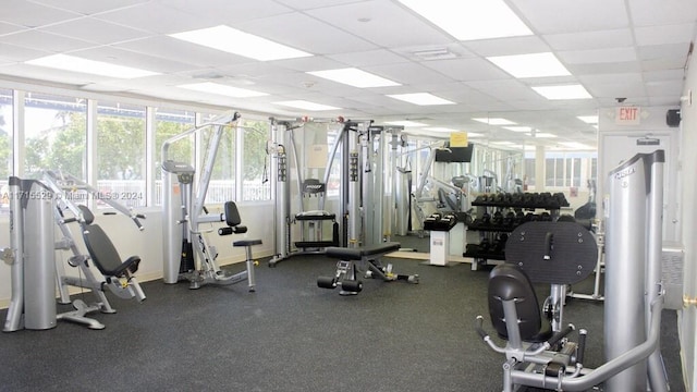 gym featuring a drop ceiling