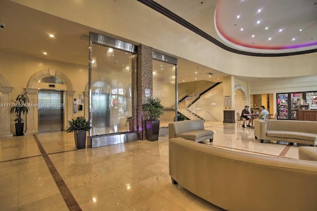 19201 Collins Ave Unit 1017, Sunny Isles Beach, FL 33160 - common area featuring recessed lighting, stairway, and a high ceiling