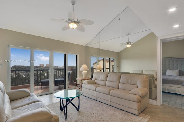 tiled living room featuring high vaulted ceiling and ceiling fan