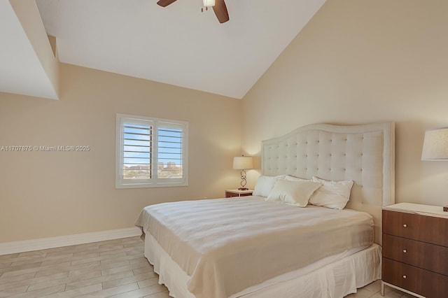 bedroom with ceiling fan and lofted ceiling