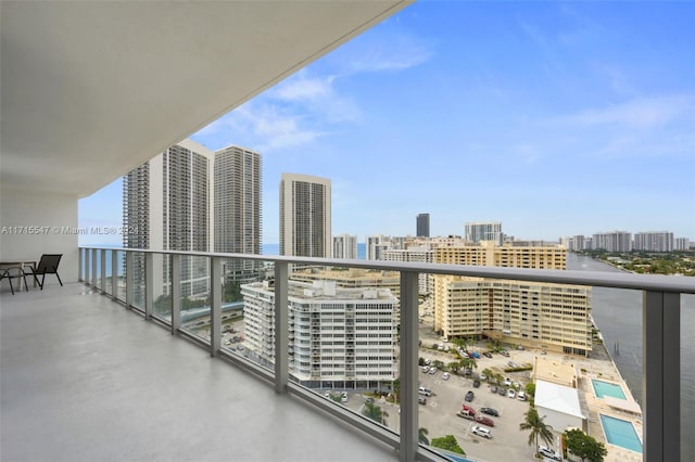 balcony featuring a water view