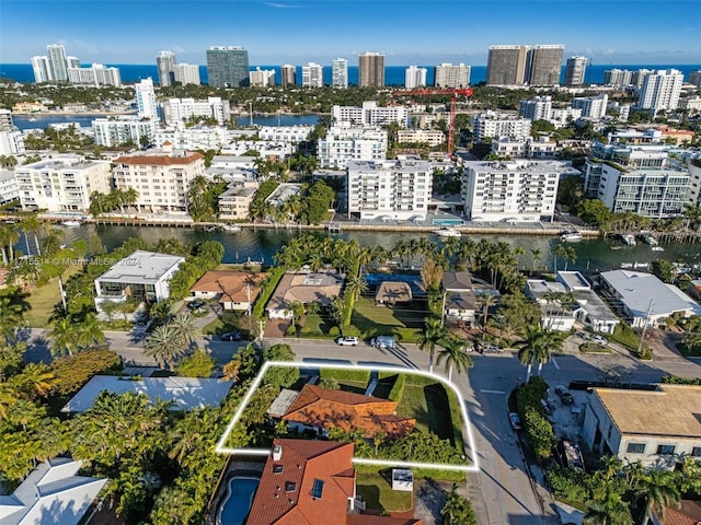 birds eye view of property featuring a water view