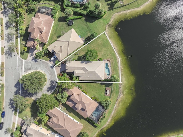 bird's eye view with a water view