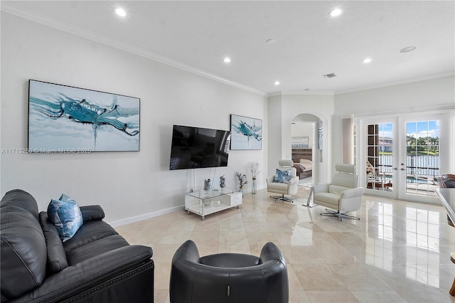 living room with crown molding and french doors