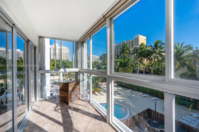 unfurnished sunroom with a wealth of natural light