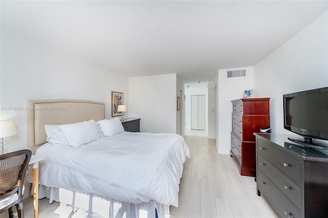 bedroom with light hardwood / wood-style flooring