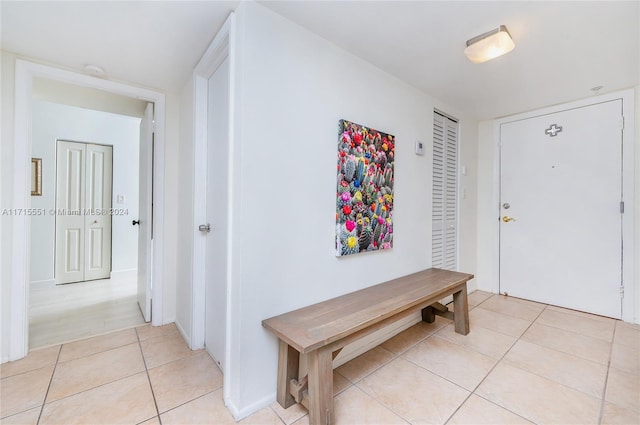 entrance foyer featuring light tile patterned floors