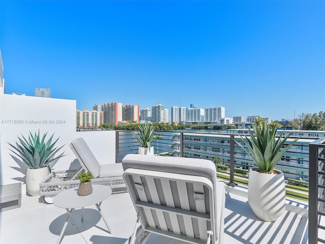 view of patio / terrace with a balcony