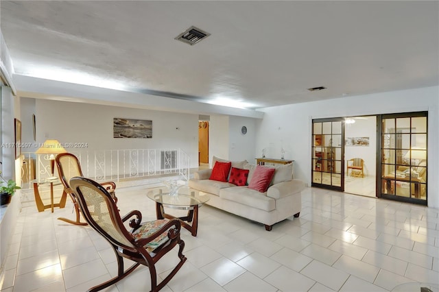 living room featuring light tile patterned flooring