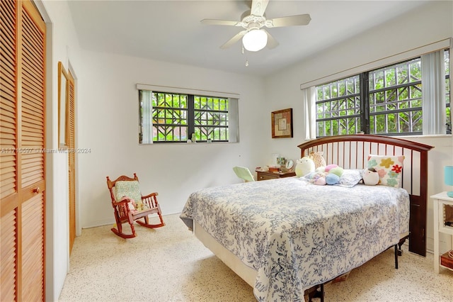 bedroom with a closet and ceiling fan