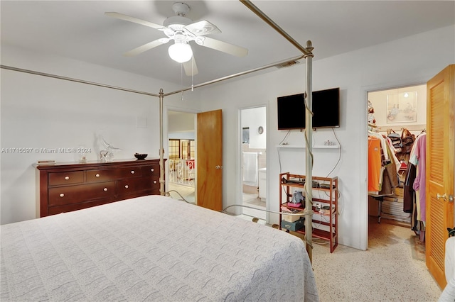 bedroom featuring connected bathroom, ceiling fan, a closet, and a spacious closet