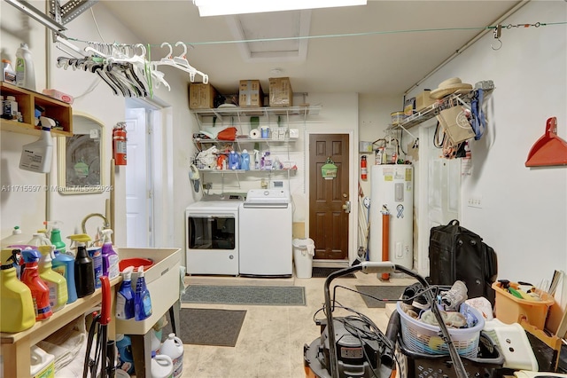 kitchen with independent washer and dryer and water heater