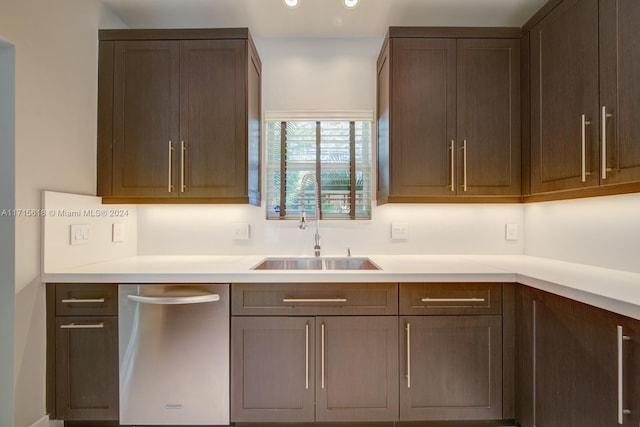 kitchen featuring stainless steel dishwasher and sink