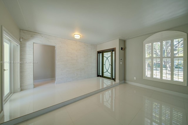 empty room featuring tile patterned floors