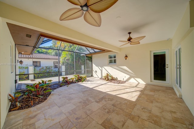 sunroom / solarium with ceiling fan