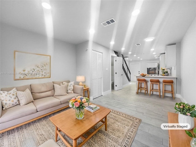 living room featuring light wood-type flooring