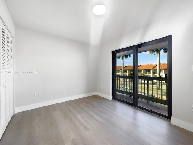 spare room featuring hardwood / wood-style floors