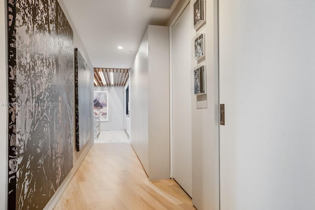 hallway featuring light hardwood / wood-style flooring