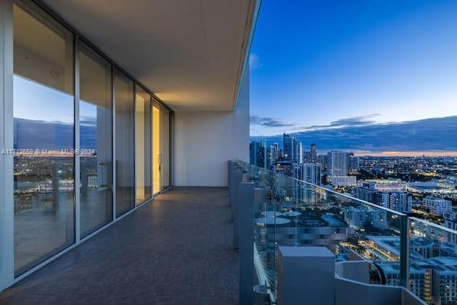 view of balcony at dusk