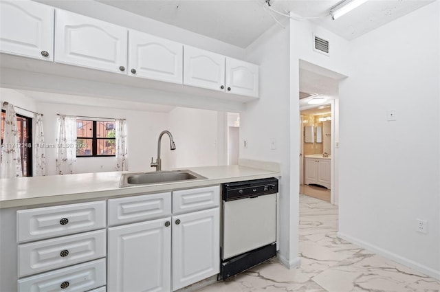 kitchen featuring dishwasher, kitchen peninsula, white cabinetry, and sink