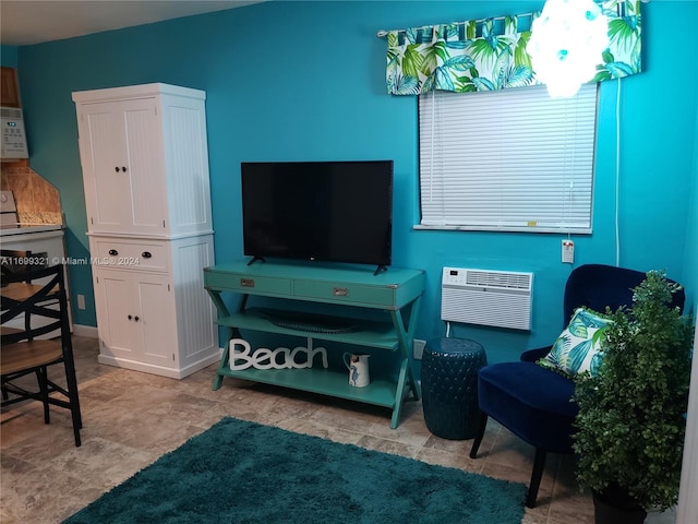 living room with an AC wall unit