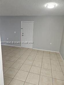 view of tiled empty room