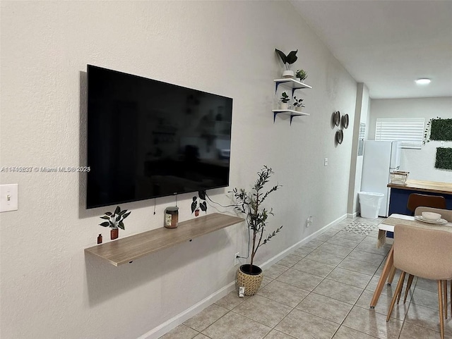 living room with light tile patterned floors