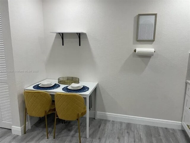 dining room featuring hardwood / wood-style flooring