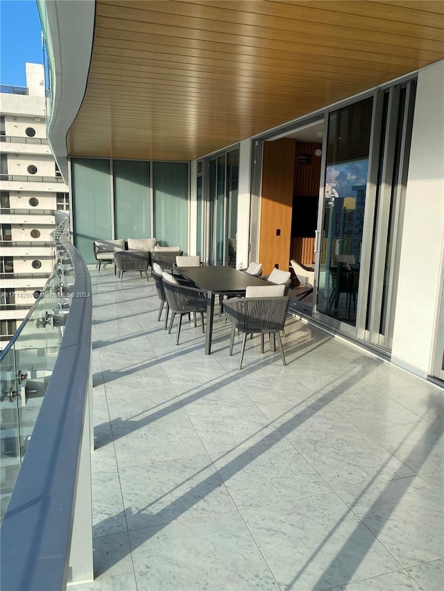 view of patio / terrace with a balcony