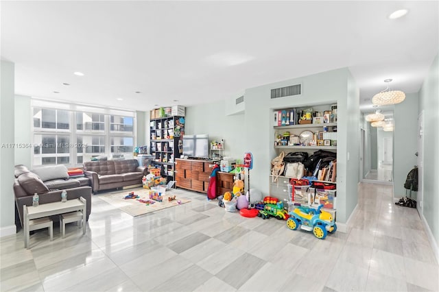 playroom featuring light tile patterned floors