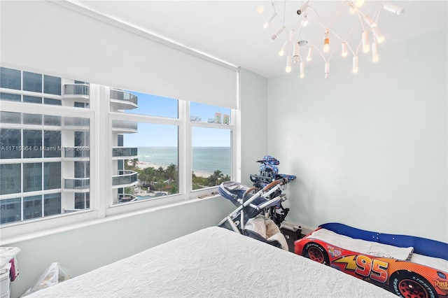 bedroom featuring a water view