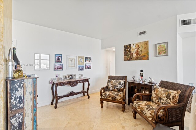 sitting room featuring light tile patterned floors