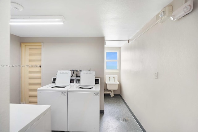 laundry area with washer and clothes dryer