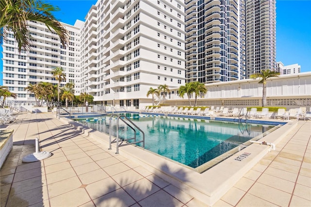 view of pool featuring a patio area