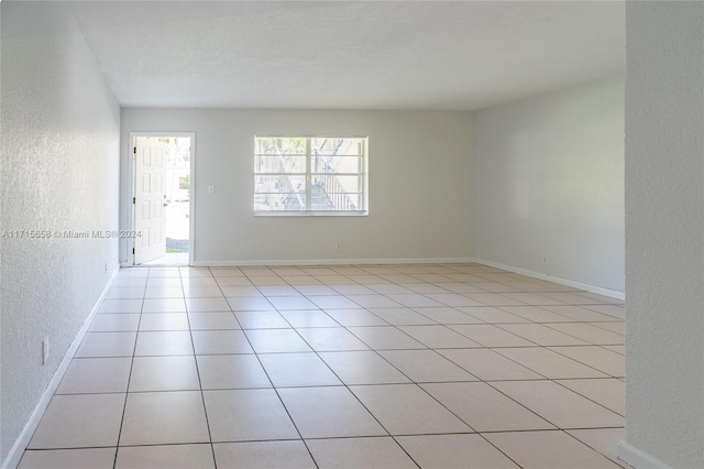 view of tiled spare room