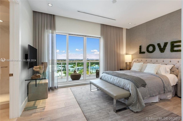 bedroom featuring light hardwood / wood-style floors