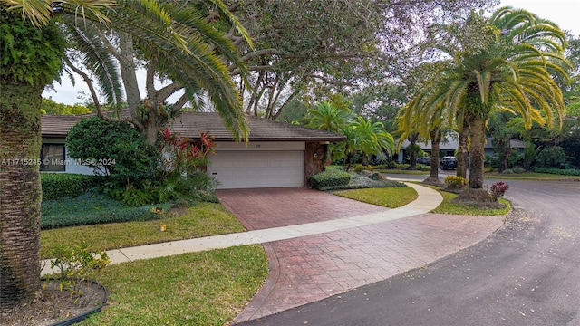 view of front of property featuring a garage