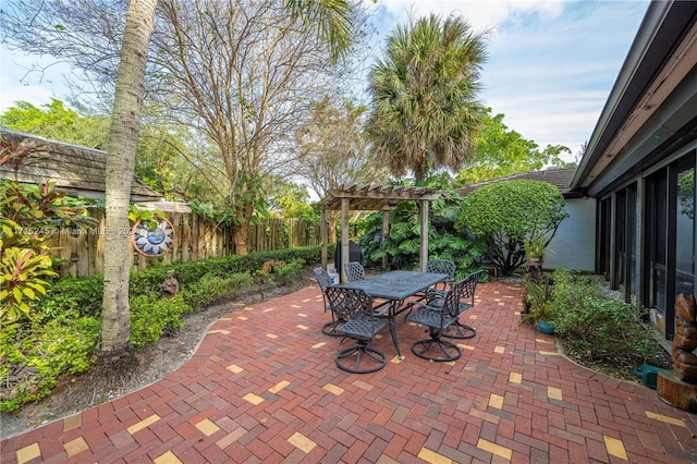 3111 N 52nd Ave, Hollywood, FL 33021 - fenced backyard with a pergola, a patio, and outdoor dining area