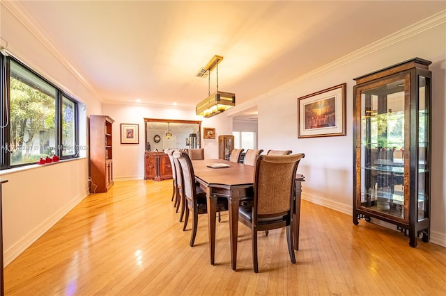 3111 N 52nd Ave, Hollywood, FL 33021 - dining room with light wood-type flooring and ornamental molding