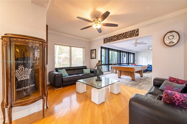 recreation room with ceiling fan, light wood-type flooring, ornamental molding, and pool table