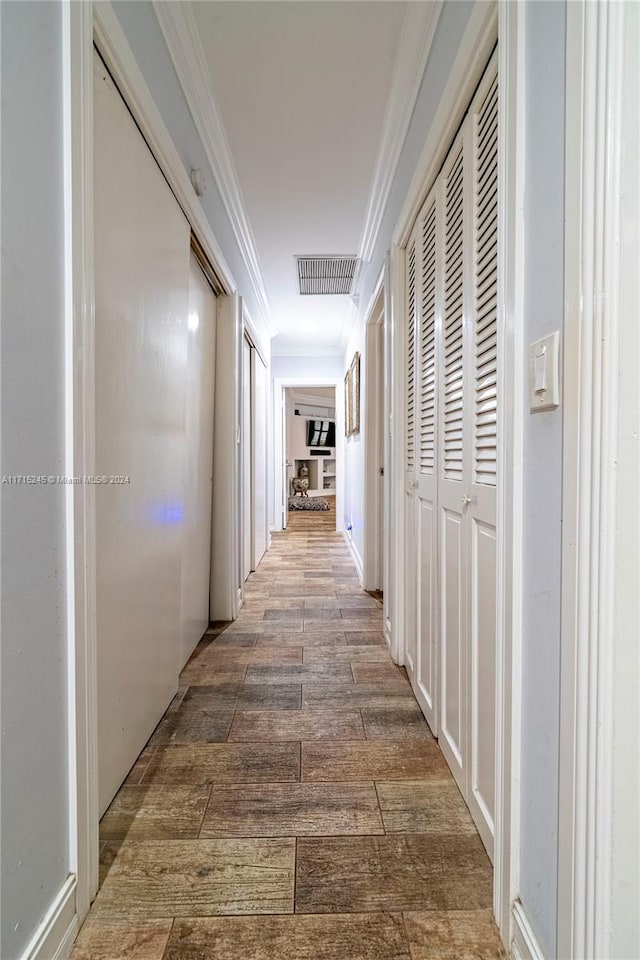 3111 N 52nd Ave, Hollywood, FL 33021 - hallway featuring ornamental molding and wood finished floors