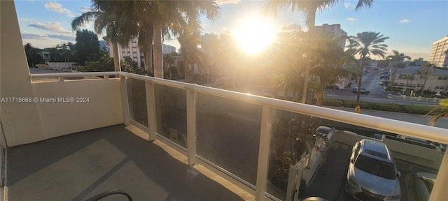 view of balcony at dusk