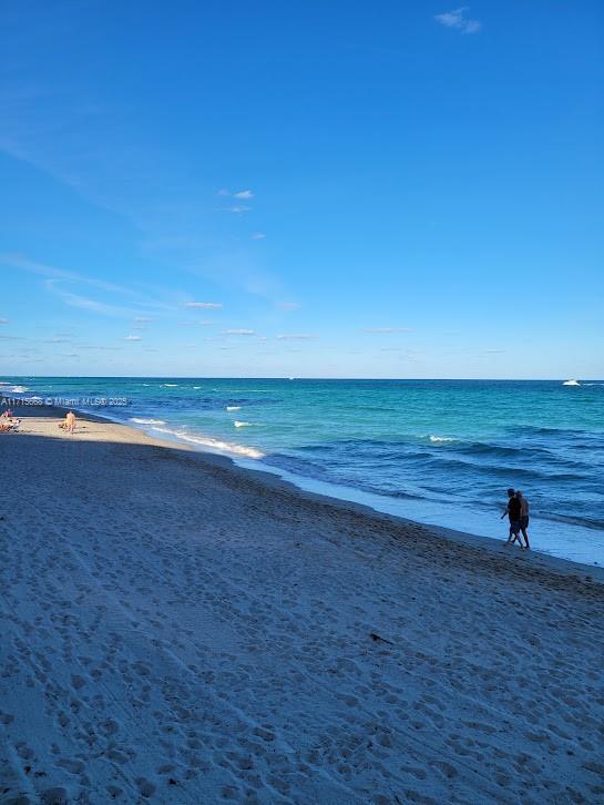 view of water feature with a view of the beach