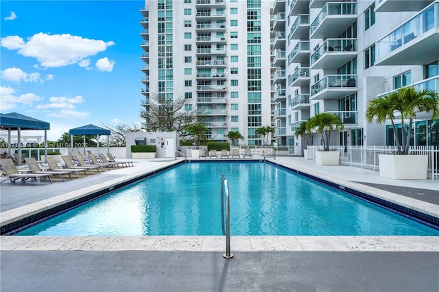 view of swimming pool featuring a patio area