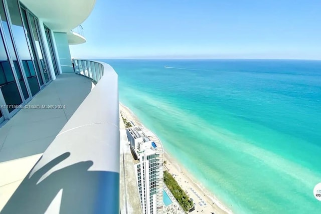 view of water feature with a beach view