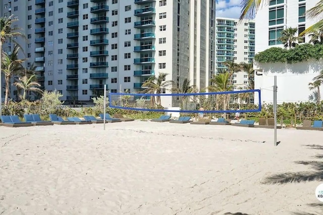 view of property's community featuring volleyball court