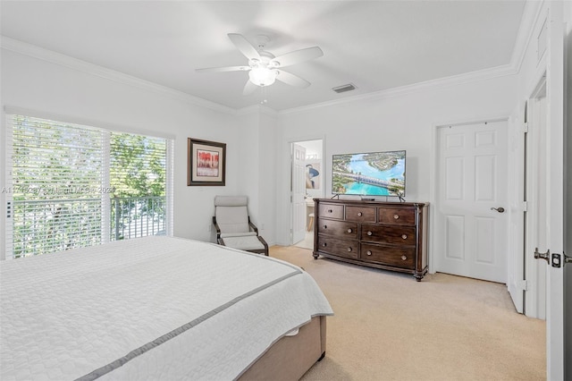 carpeted bedroom with ceiling fan and crown molding