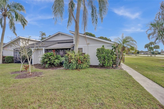 view of front of house with a front lawn