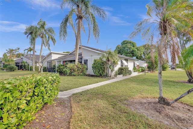 view of front of house featuring a front lawn