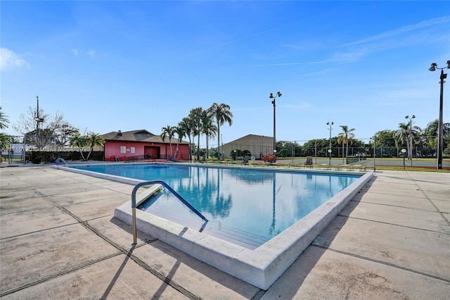 view of pool featuring a patio